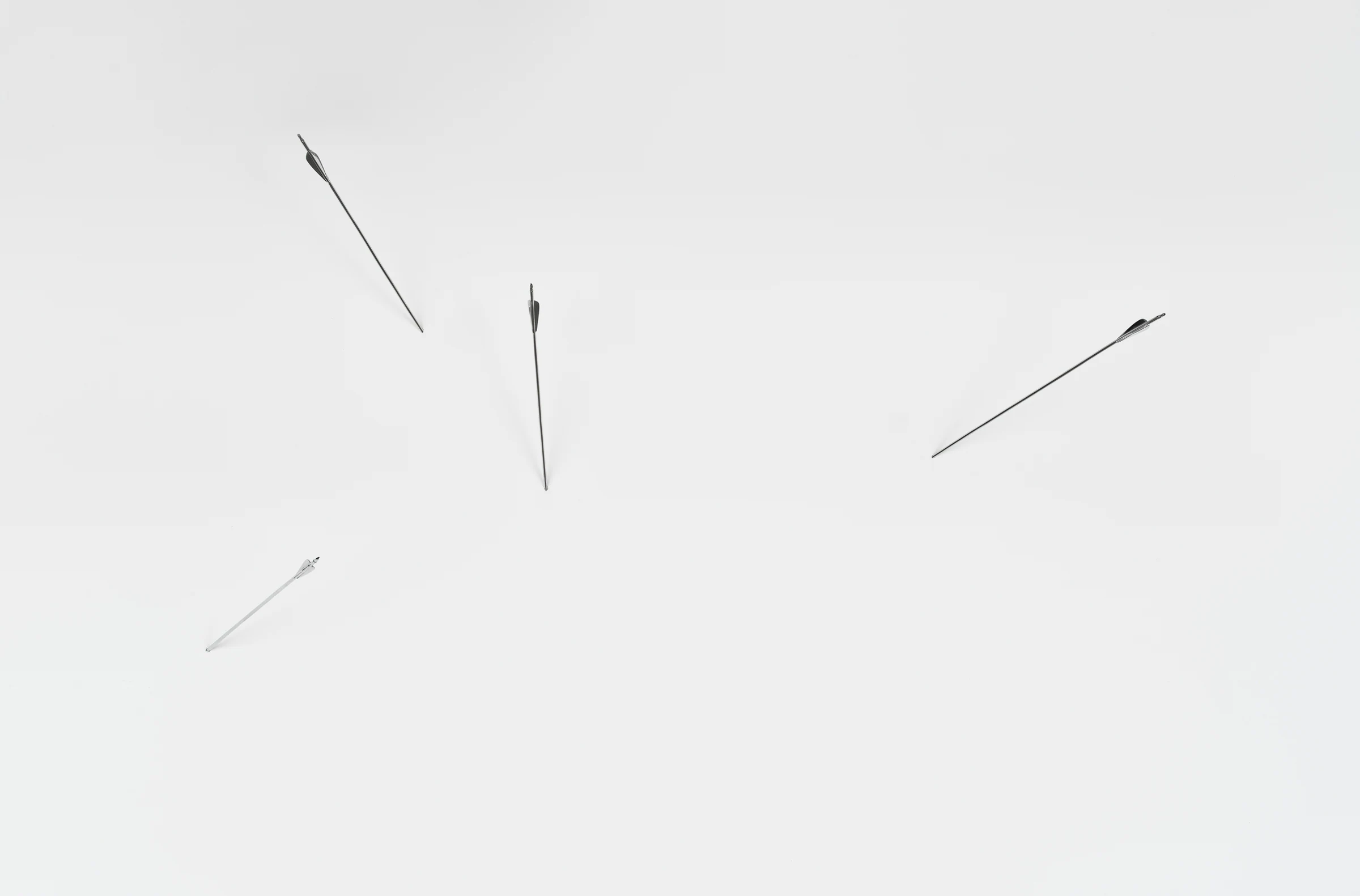 Olivia Erlanger, Eros, 2024, Four polished aluminum arrows, Dimensions variable